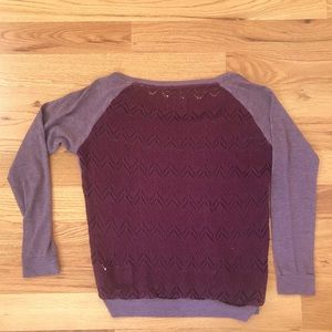 Boutique sweater with crochet back.